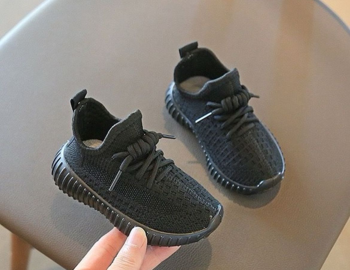 Trendy black sneakers