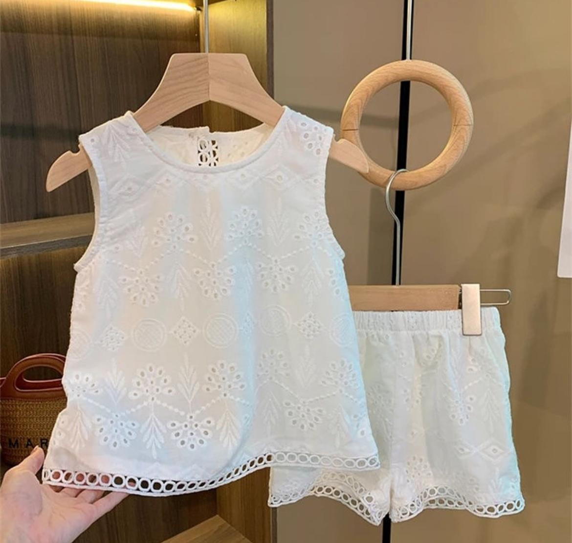 white shorts and top set