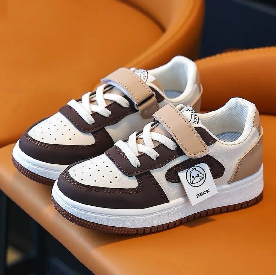 Brown and white sneakers