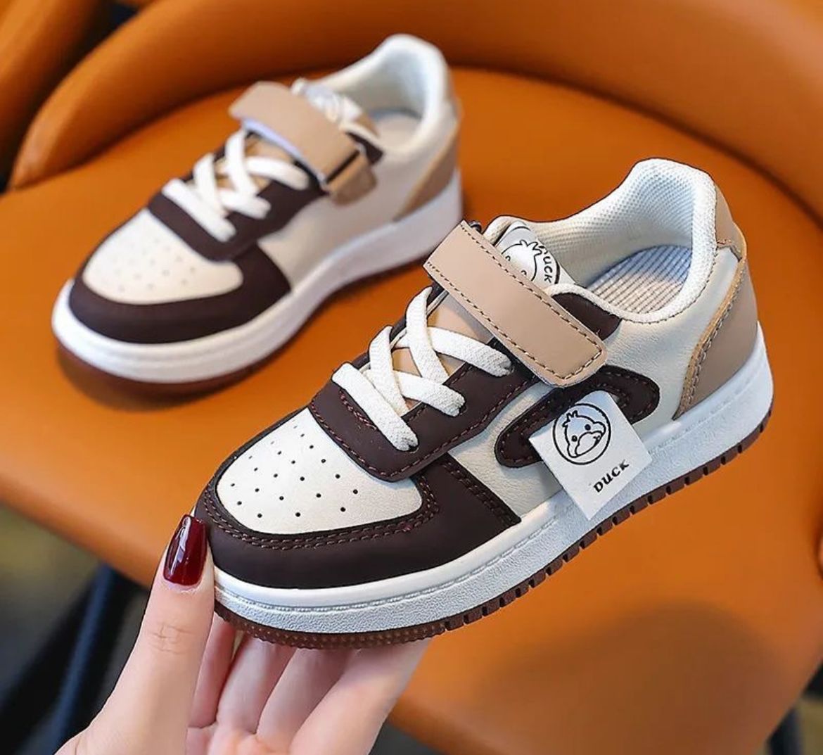 Brown and white sneakers