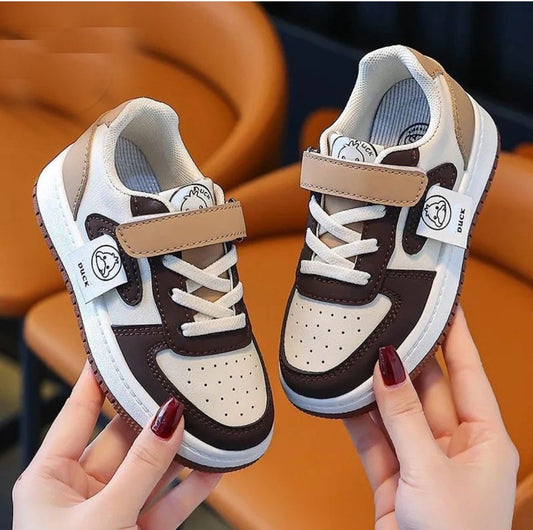 Brown and white sneakers