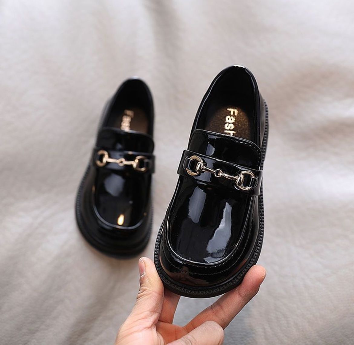 Black patent loafers