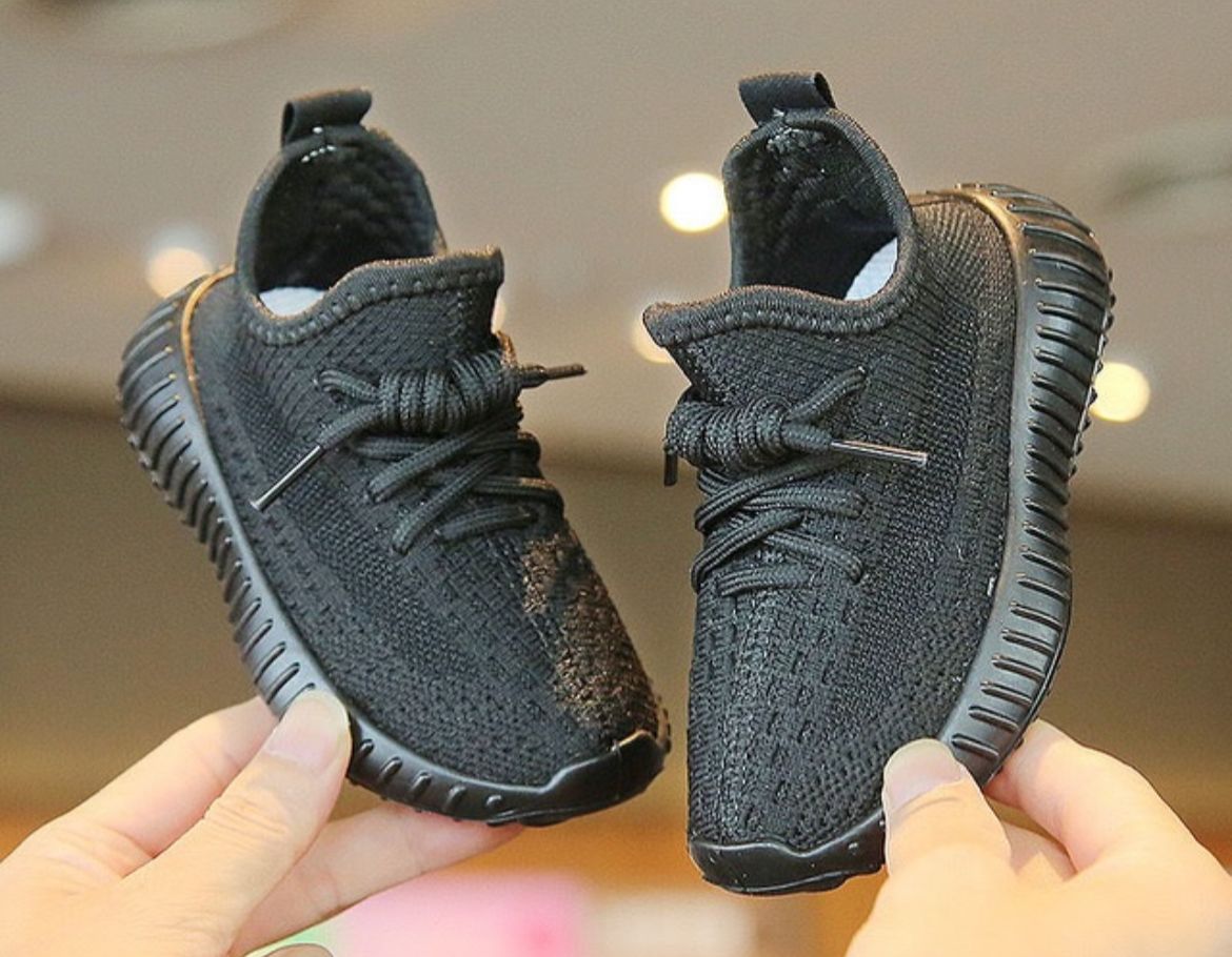 Trendy black sneakers